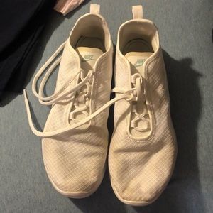 White Nike Air tennis shoes